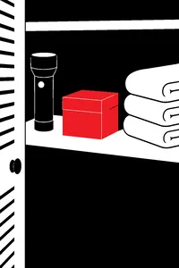 A small sealed cube-shaped box on a hall closet shelf between a flashlight and a stack of towels.