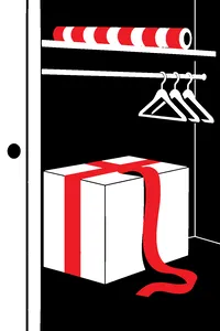A sealed shipping box in a closet with a loose ribbon and a roll of wrapping paper resting on it.