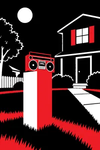 A boombox held up on a lawn outside a suburban house at night, one upstairs window lit.