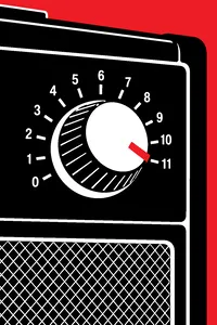 A guitar amplifier close up, its volume knob pointing to a dial number 11.