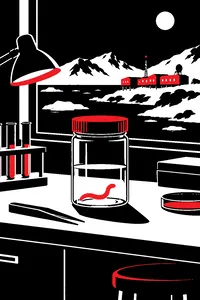 A snowbound Arctic research station at night with a glass specimen jar containing a single small worm on the lab bench.