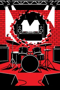A drum kit on a stage with a brick wall knocked through in the middle, turntables on the other side.