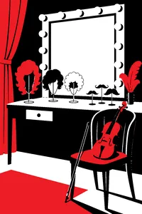 An empty dressing room mirror ringed with bulbs, a row of wigs and false mustaches on stands, and a violin resting on the chair.