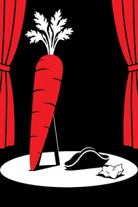 A seven-foot-tall carrot propped on a stage beside a pirate hat and a crumpled handwritten note.
