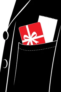 A plastic gift card wedged in a coat pocket next to a receipt.