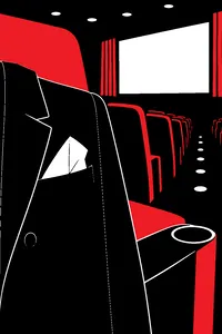 A clean folded tissue tucked in a coat pocket in a dim movie theater seat.