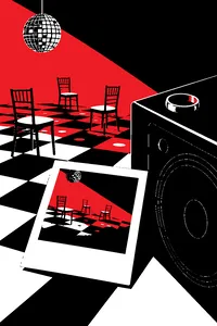An instant camera photo developing on a dance floor next to a wedding ring left on a speaker.