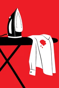 A steam iron standing upright on a faded ironing board, a dress shirt draped over the end with a fresh water spot.