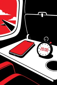 A cell phone glowing on an airplane tray table with a stopwatch beside it reading 20:00.