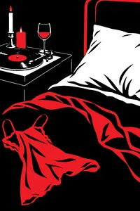 A satin pillow on a dark velvet bed, a vinyl single spinning on a turntable beside it in low candlelight.
