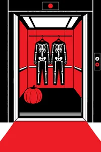 An old-fashioned elevator with open doors, a carved jack-o'-lantern on the floor and two skeleton costumes on hangers.