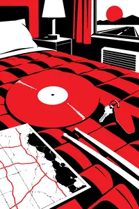 A translucent yellow vinyl record on a motel bedspread next to drumsticks, a room key and a highway map.