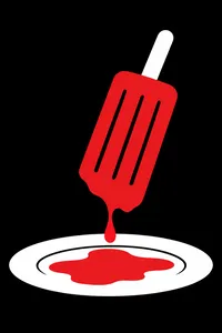 A red popsicle melting onto a white plate