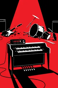 An old home organ with a blinking rhythm box on top, a smashed guitar and a toppled drum kit behind it on a stage.