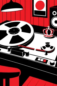 A tiny reel of tape spliced onto the end of a much bigger reel, a small crown resting on the tape deck in a wood-paneled studio.