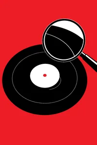 A 7-inch record with only a single thin groove cut into it, sitting under a magnifying glass.