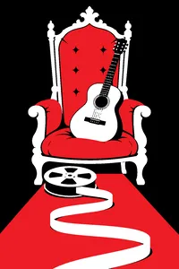 A small acoustic guitar resting on a velvet throne cushion, a long strip of blank leader tape trailing off the end of a reel.