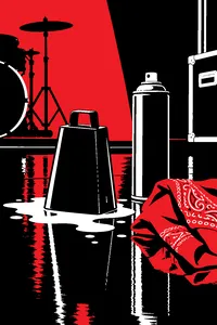 A cowbell sitting in a puddle of hairspray beside an aerosol can and a bandana on a glossy stage.