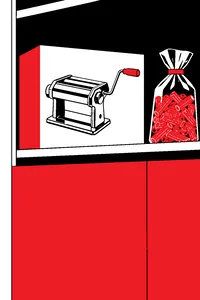 A sealed box with a line drawing of a chrome hand-crank pasta machine, on a high cabinet shelf beside a bag of dried pasta.
