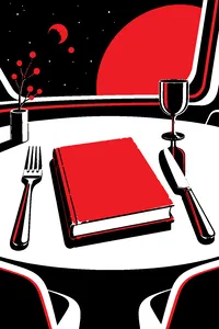 A dusty alien cookbook on a gleaming spaceship dining table set with a giant fork and knife.