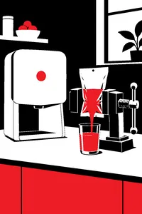 A sleek white countertop juicer next to a pouch of juice being squeezed flat into a glass by an empty kitchen vise.