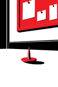 A brass thumbtack point up on beige carpet below a corkboard.